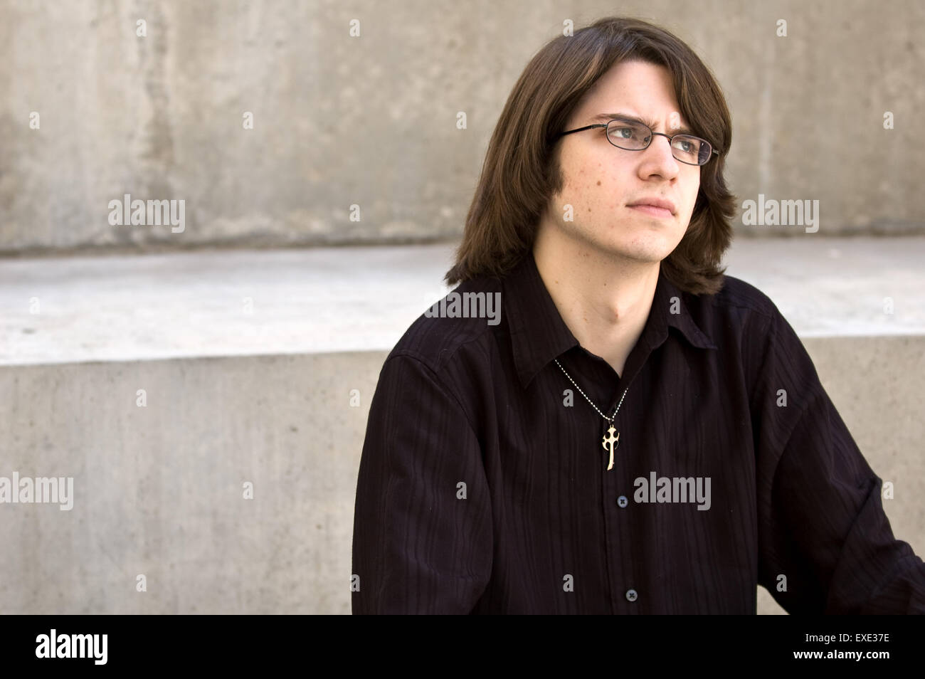 a single, white, 20 something, pondering something. Stock Photo
