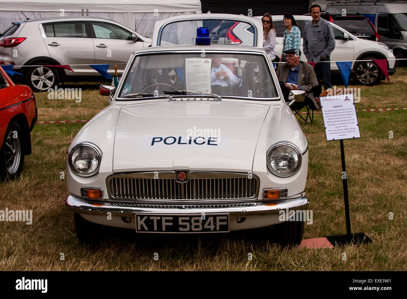 Glamis, Scotland, UK. 12h July, 2015. 1968 MG MGB GT Police car at the