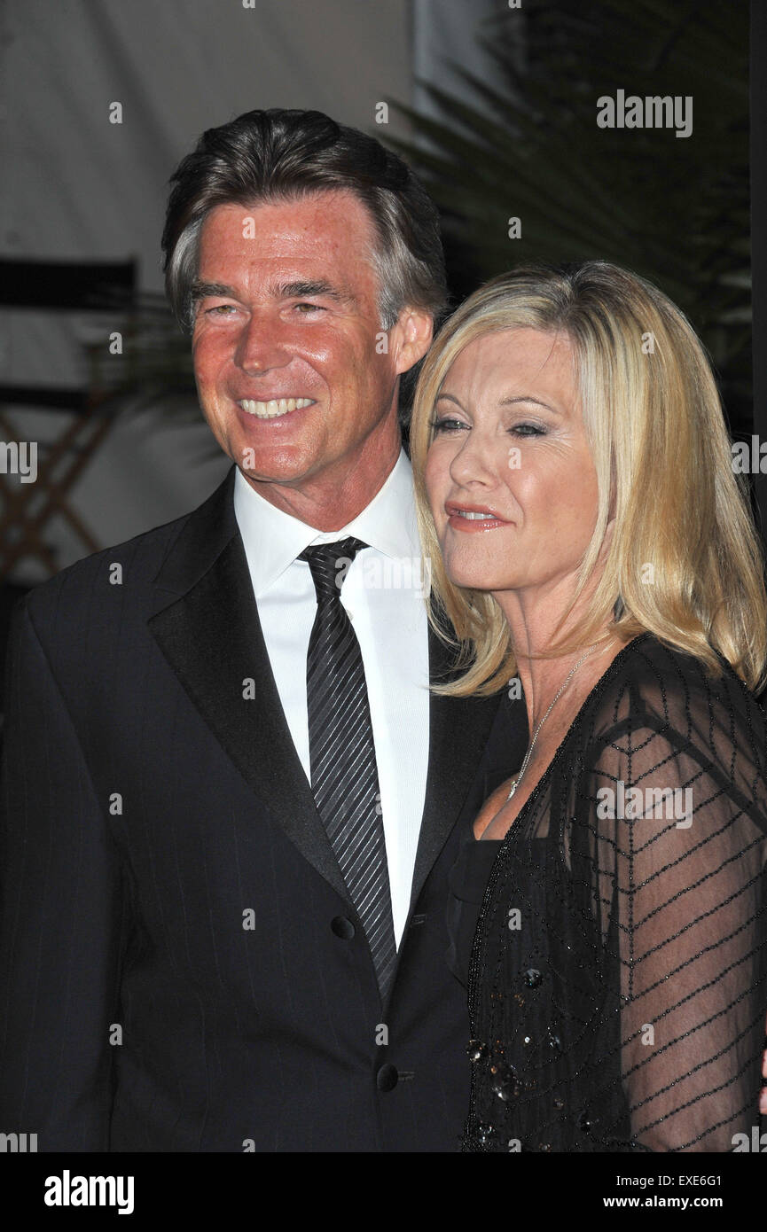 LOS ANGELES, CA - JANUARY 22, 2011: Olivia Newton-John & husband John Easterling at the 2011 G'Day USA Black Tie Gala at the Hollywood Palladium. Stock Photo