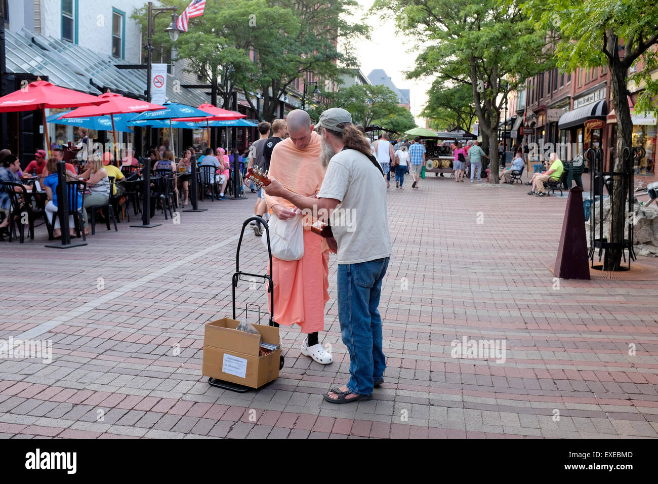 Hare Krishna singings march through the street Stock Photo - Alamy