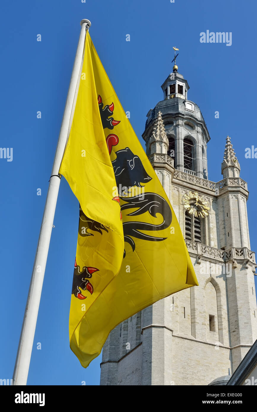 Flemish flag installed on Grand Place in Halle in day of Flemish Community Celebration on July 11, 2015 Stock Photo