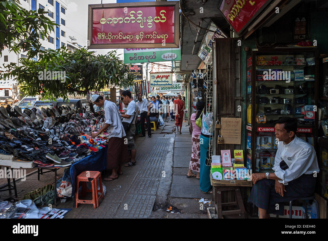 Street vendors, shops, Bo Gyok Road, Yangon, Myanmar Stock Photo