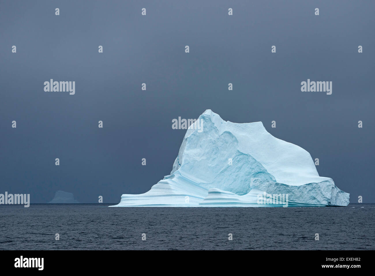 Iceberg floating in the water, Scoresbysund, Eastern Greenland, Greenland Stock Photo