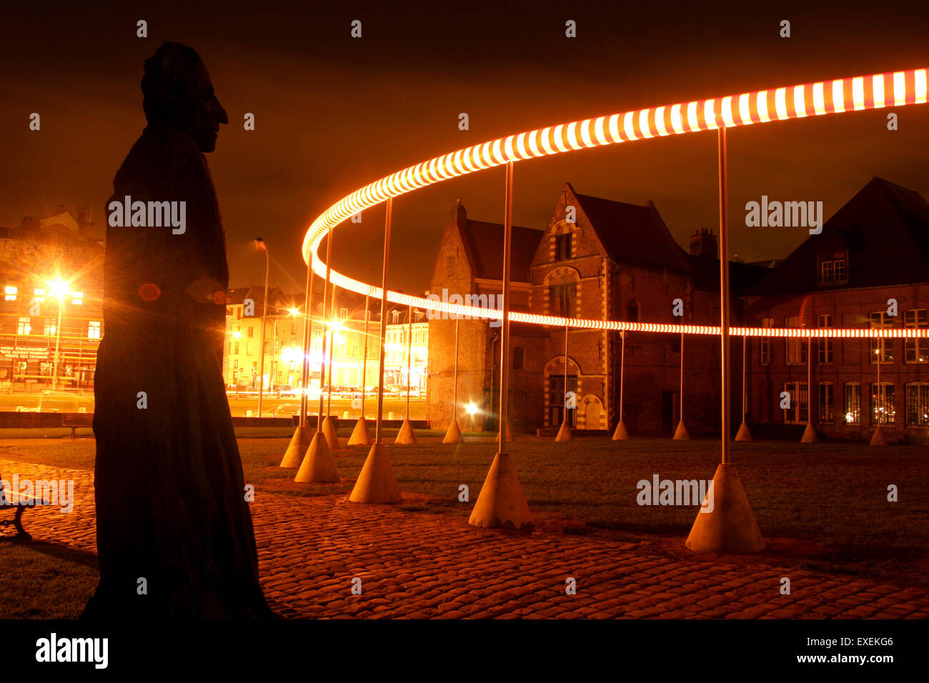 The art installation 'Cercle Lumineux' by artist Daniel Buren, outside the Musée de L'Hospice Comtesse in the old part of Lille, France Stock Photo