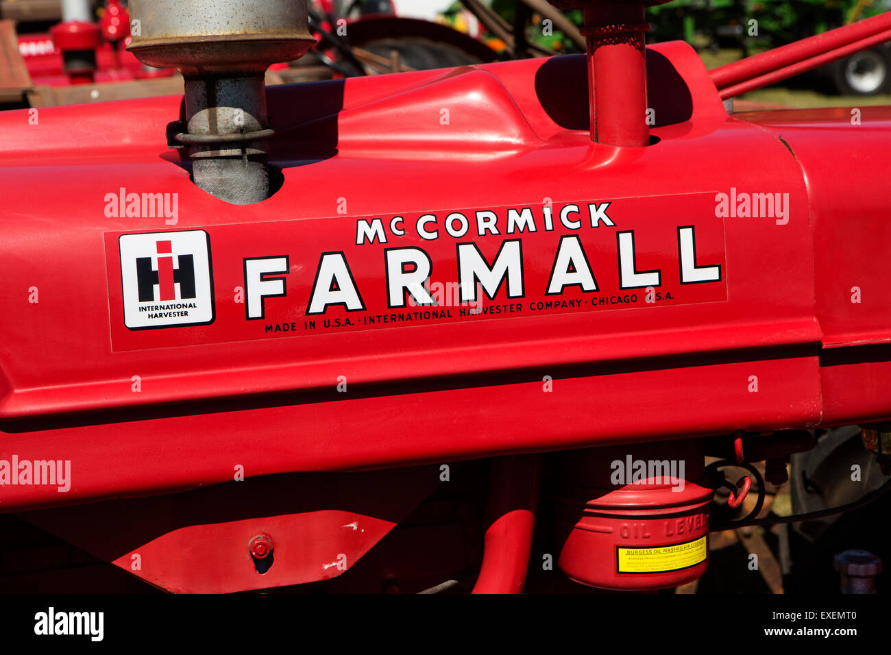 McCormick Chrome And Red Enamel Tractor Badge