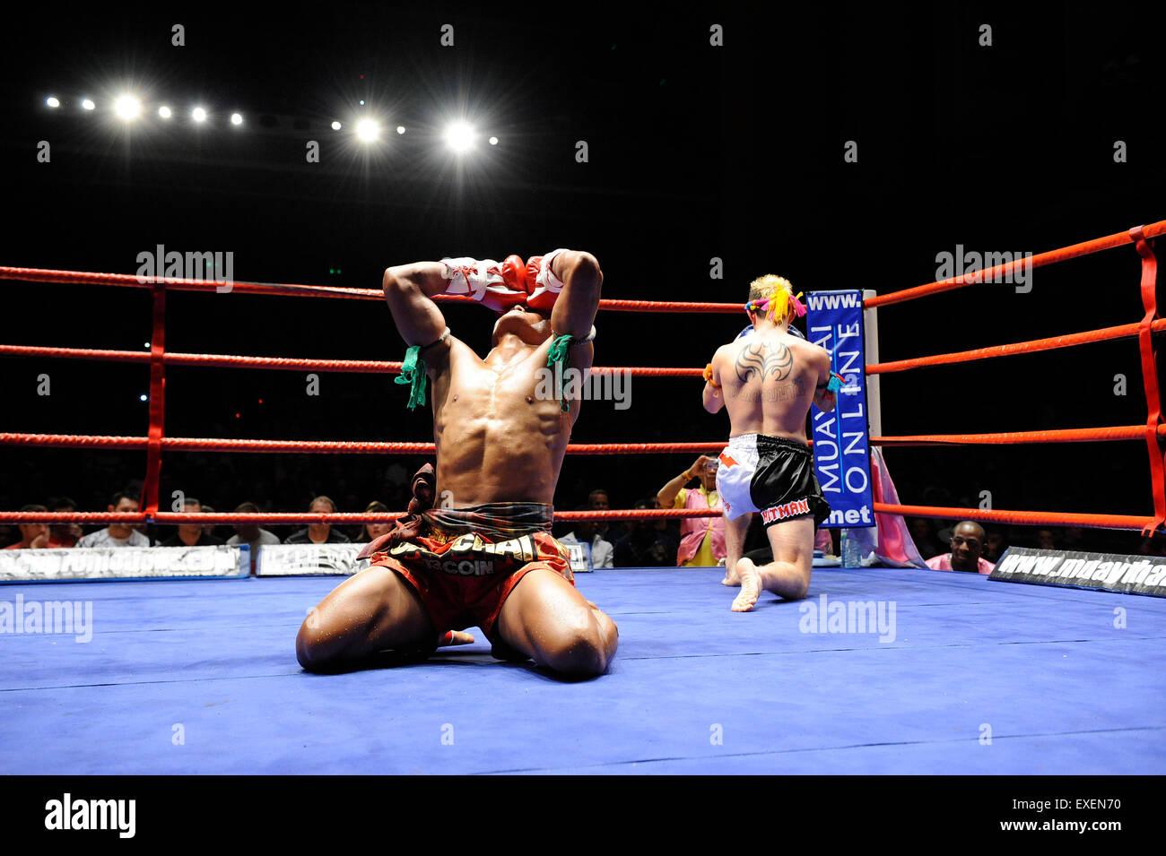Muay Thai fighters perform the Ram Muay pre fight ritual Stock Photo