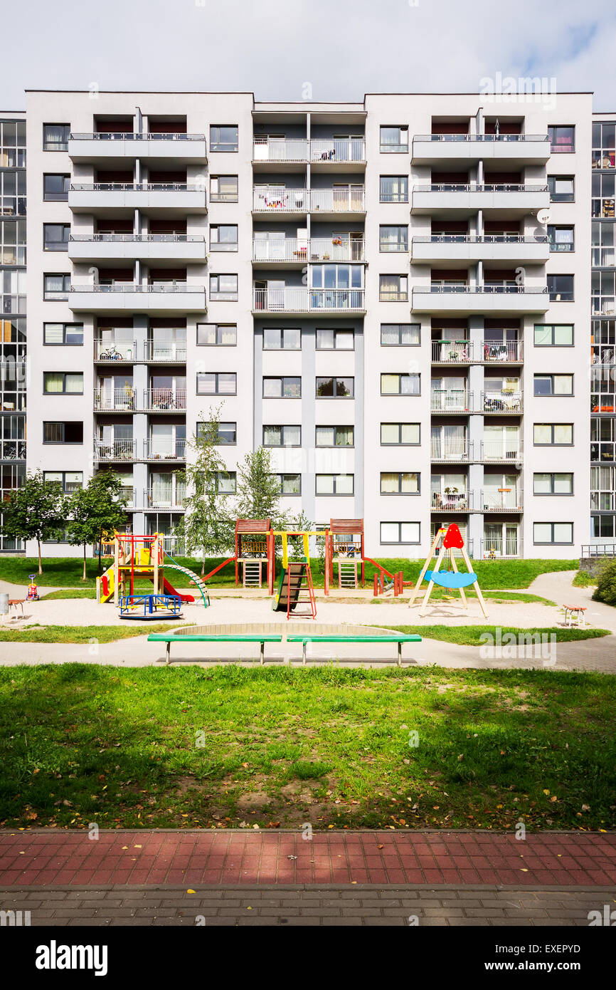 View of Modern apartment building with kids playground Stock Photo - Alamy