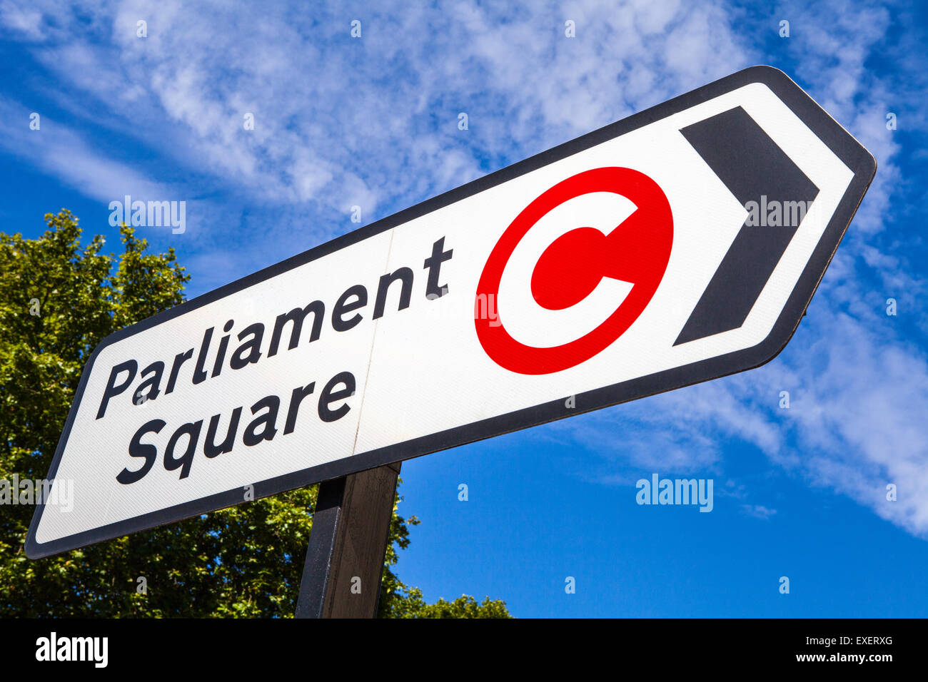 LONDON, UK - JULY 10TH 2015: A road sign pointing to the direction of Parliament Square and also displaying the Congestion Charg Stock Photo