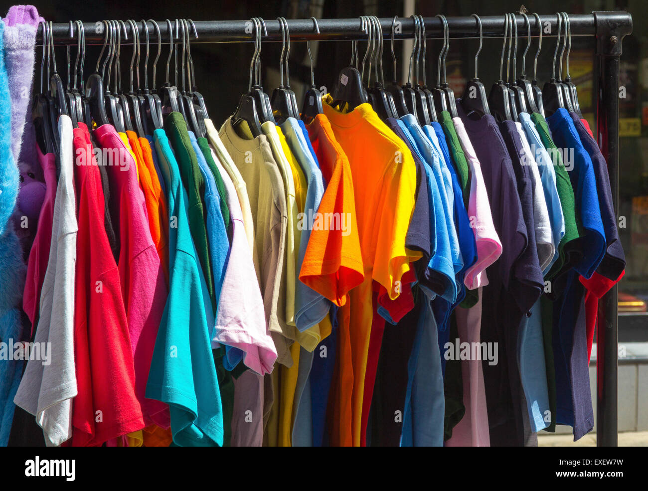 Many summer dresses in various colors Stock Photo