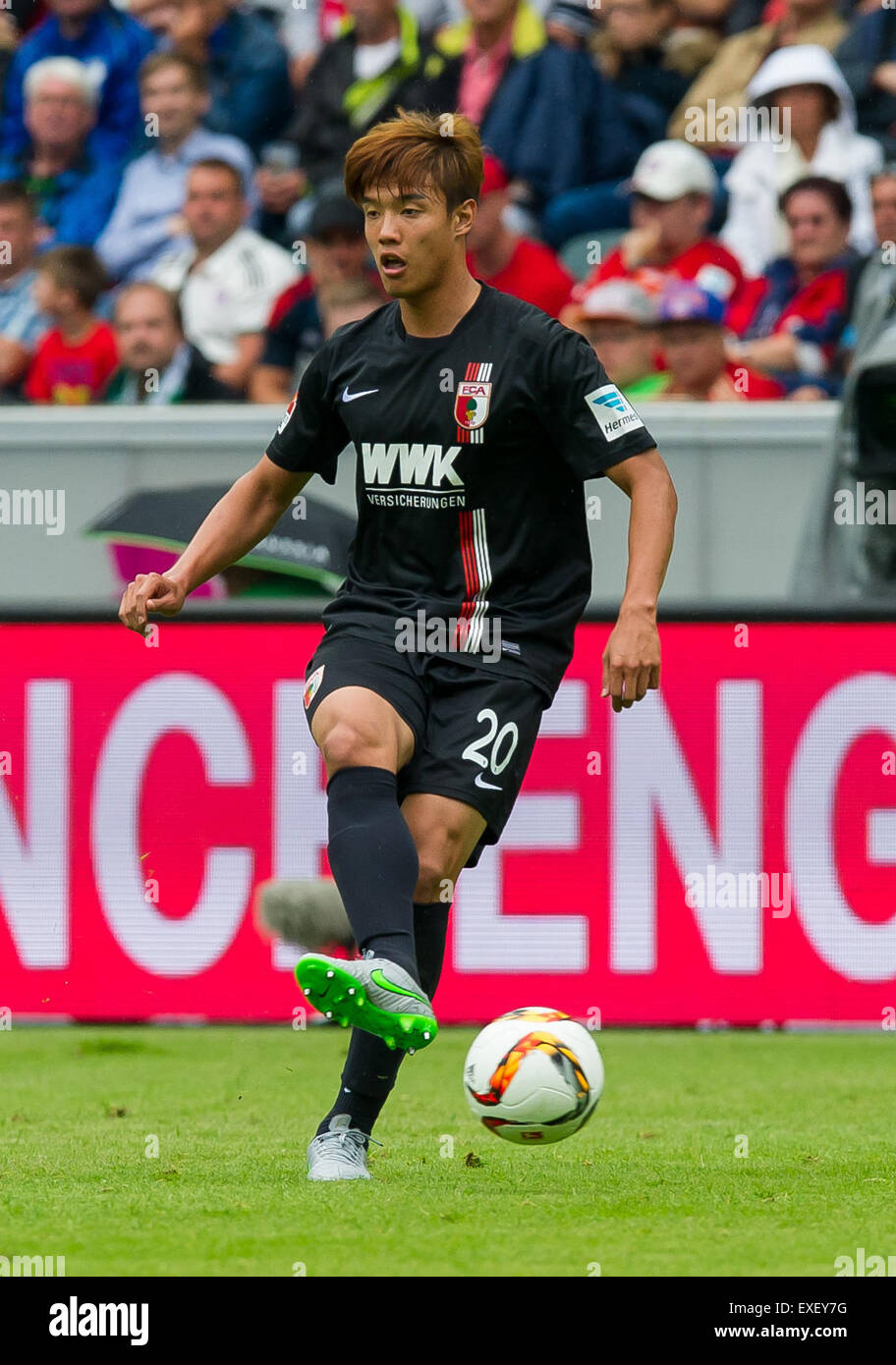 Moenchengladbach, Germany. 12th July, 2015. Augsburg's Jeong-Ho Hong in action during the Telekom Cup soccer match between FC Bayern Munich and FC Augsburg at Borussia Park in Moenchengladbach, Germany, 12 July 2015. Photo: Guido Kirchner/dpa/Alamy Live News Stock Photo