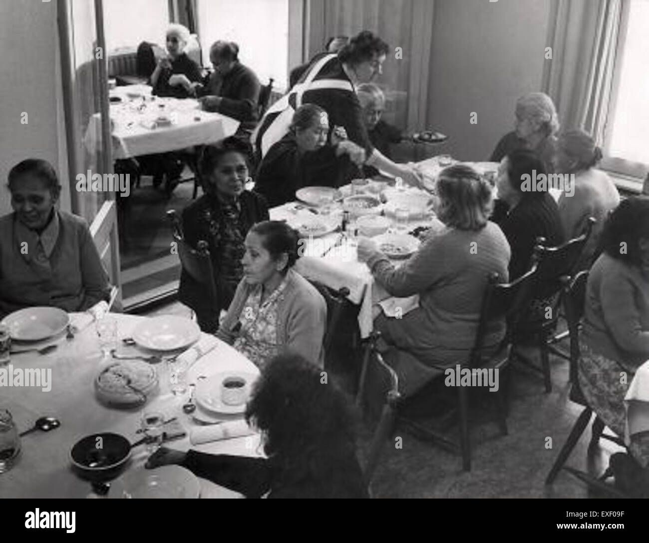 Discuss Repatriation This image, titled 'Repatrianten,' likely represents the theme of ...
