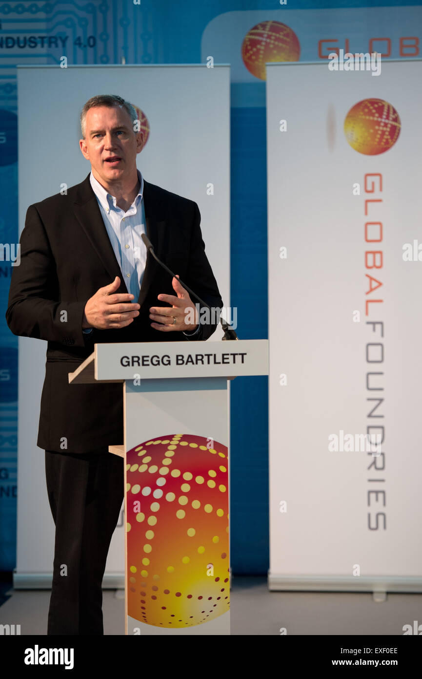 Dresden, Germany. 13th July, 2015. The senior Vice President of Globalfoundries, Gregg Bartlett, speaks during a press conference in Dresden, Germany, 13 July 2015. At the press conferenfce the new semi-conductor '22FDX' technology was introduced. Globalfoundaries plan an investment in Saxony until 2017 of around 250 million US dollars for the introduction of the technology-development and the subsequent enlargement of their productions capacity. Photo: ARNO BURGI/dpa/Alamy Live News Stock Photo