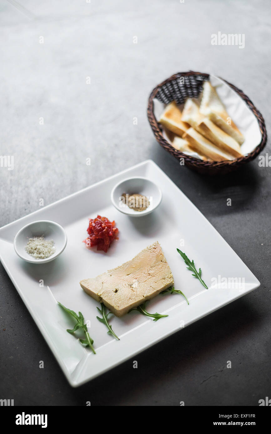 foie gras french traditional duck pate with bread in modern minimal