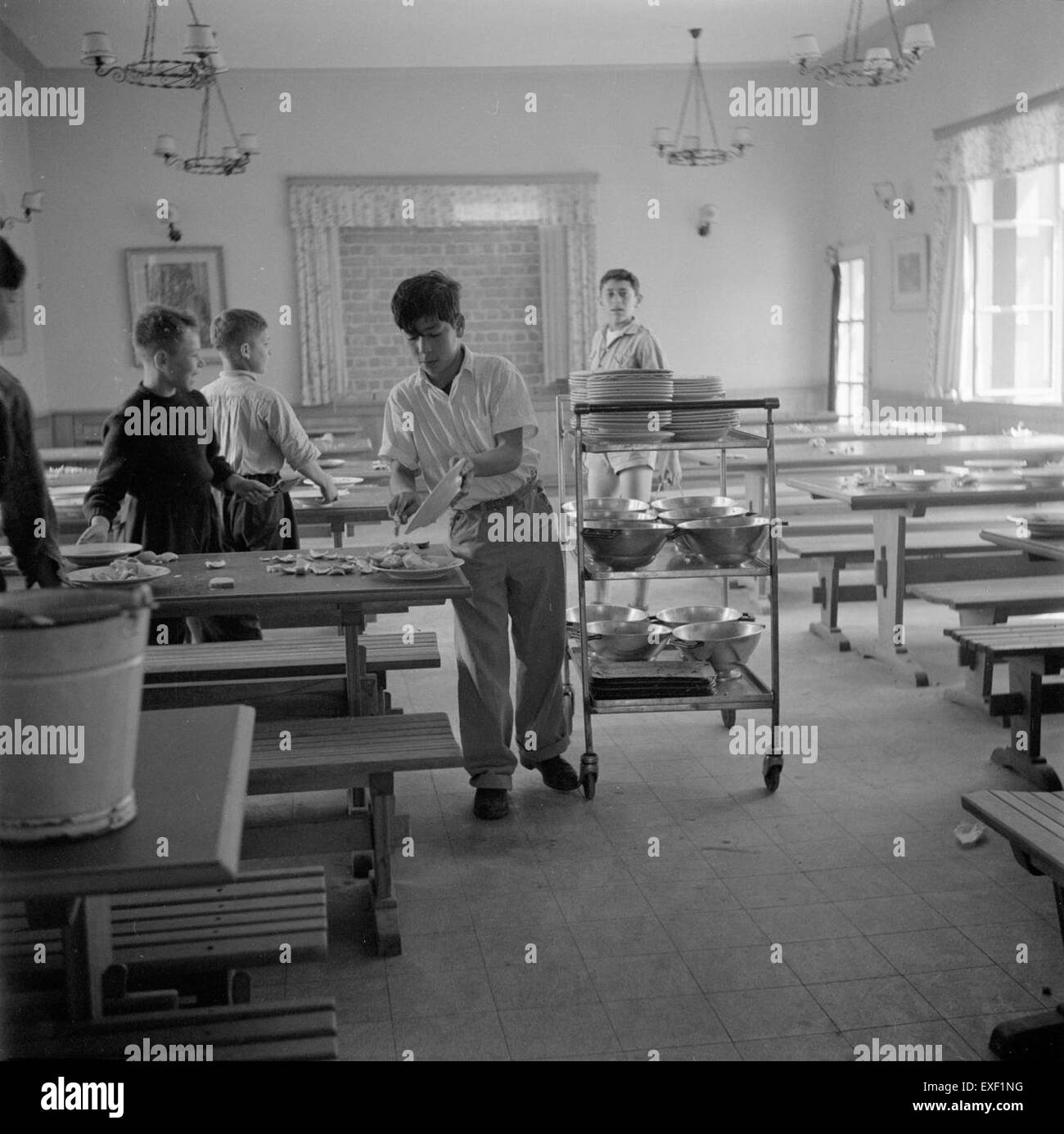 Corvee in eetzaal  Fatigue duty in dining-room Stock Photo