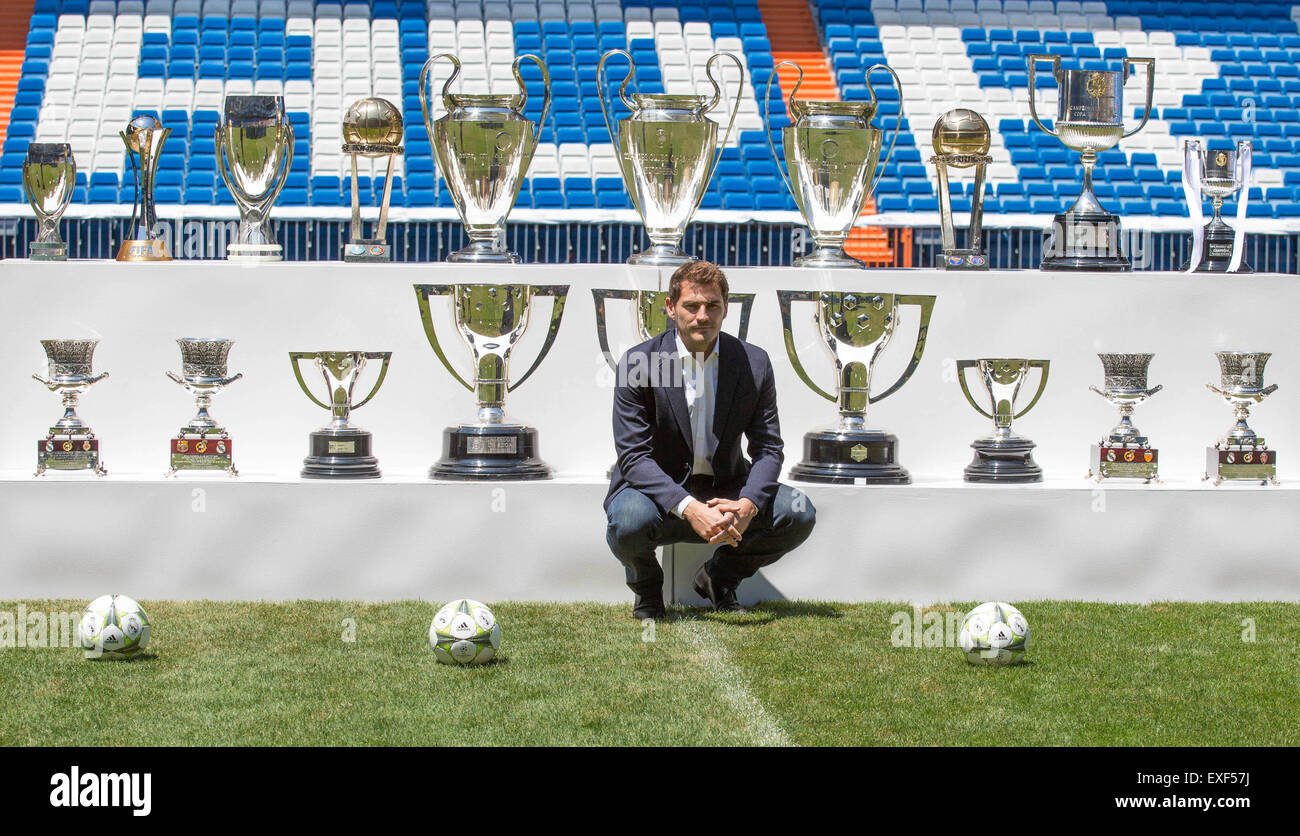 Madrid, Spain. 13th July, 2015. Former Real Madrid's goalkeeper Iker Casillas poses with the 19 trophies he won with Real Madrid in 16 seasons during an official send-off ceremony at the Santiago Bernabeu stadium in Madrid, Spain, July 13, 2015. 34-year-old Iker Casillas will leave the Spanish La Liga top club for FC Porto after 25 years playing for Real Madrid. © Javi/Xinhua/Alamy Live News Stock Photo