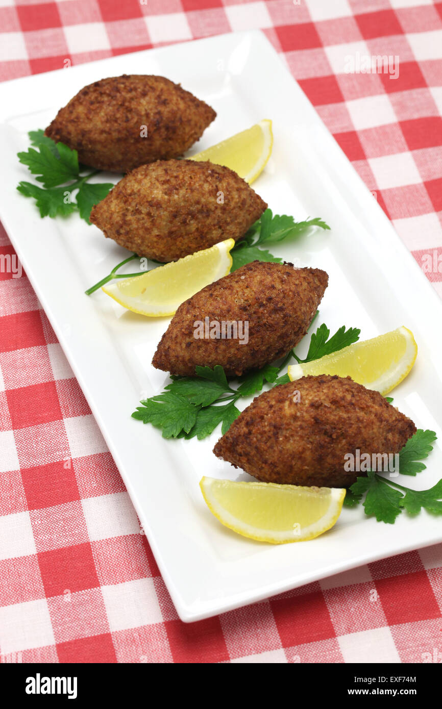 homemade kibbeh, middle eastern food, fried croquette with bulgur and minced lamb Stock Photo
