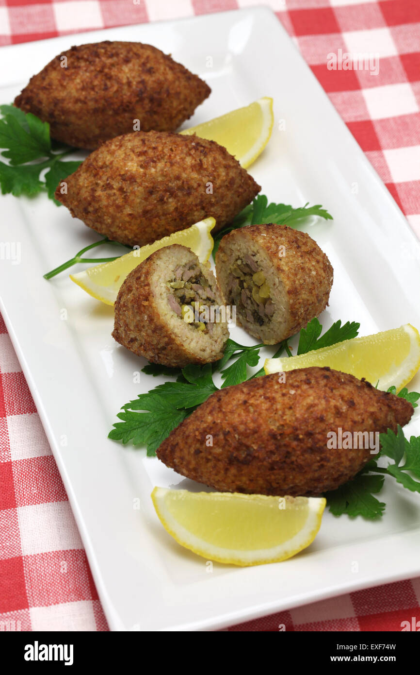 homemade kibbeh, middle eastern food, fried croquette with bulgur and minced lamb Stock Photo