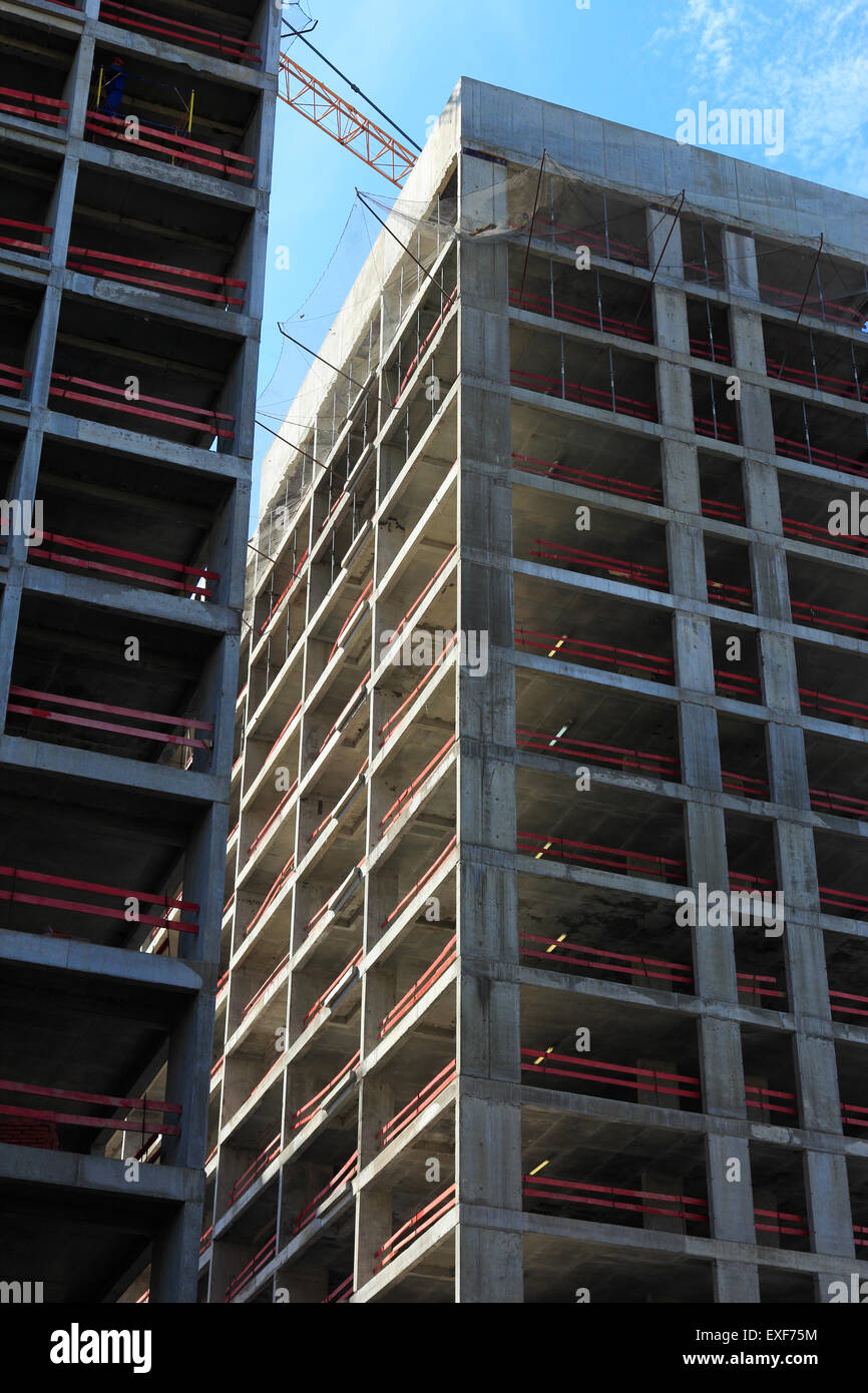 New concrete highrise residential buildings under construction. Stock Photo