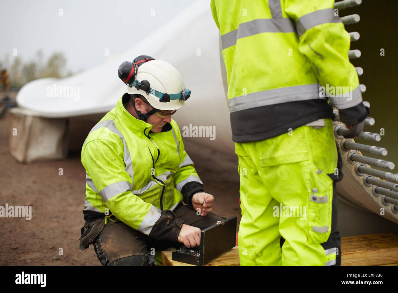Engineers working on wind turbine Stock Photo Alamy