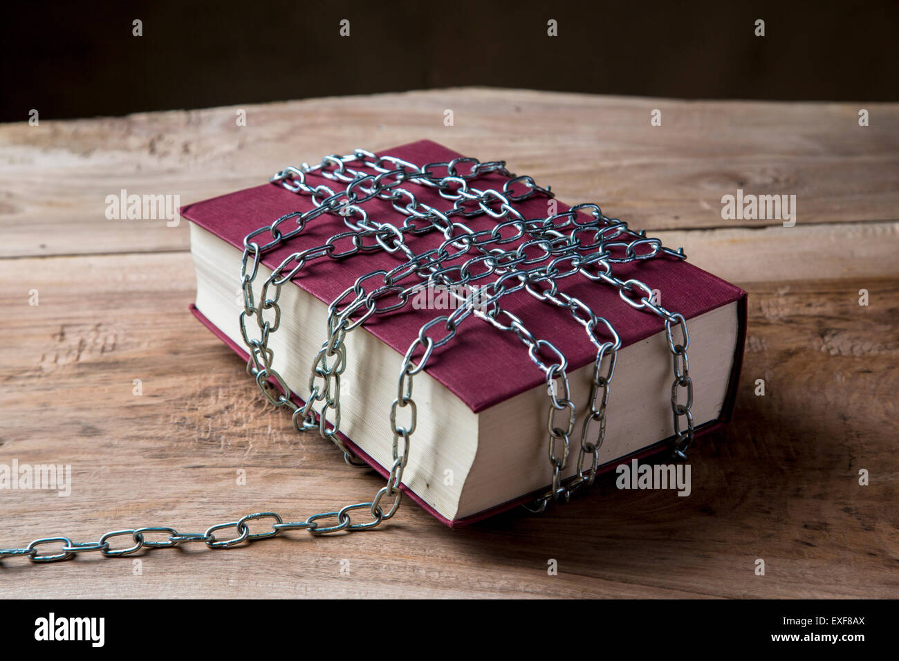 Book with chains wrapped around it Stock Photo Alamy