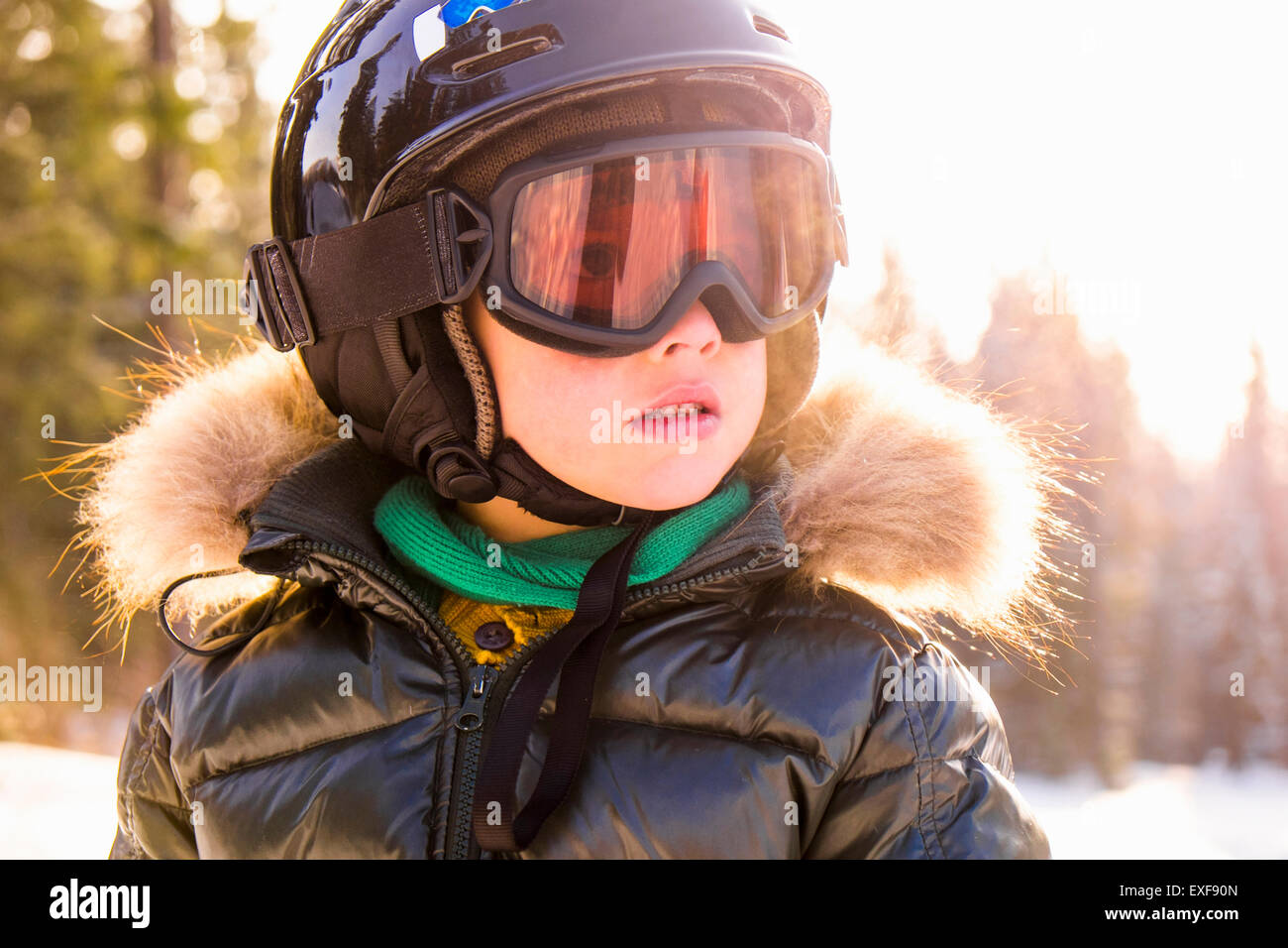 Close up portrait of boy wearing helmet and goggles, Nizhniy Tagil, Sverdlovsk Region, Russia Stock Photo