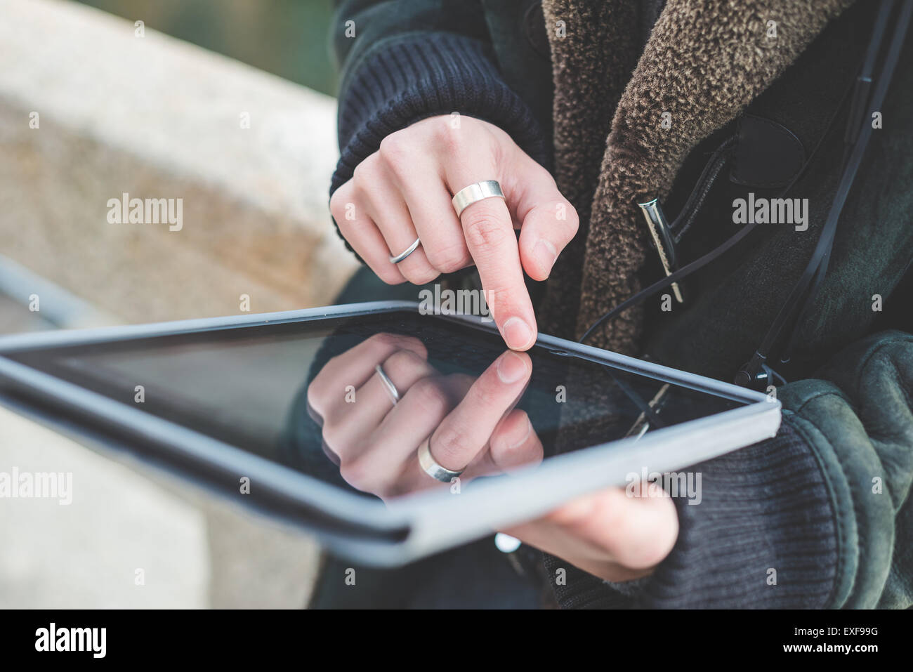 Man using digital tablet Stock Photo