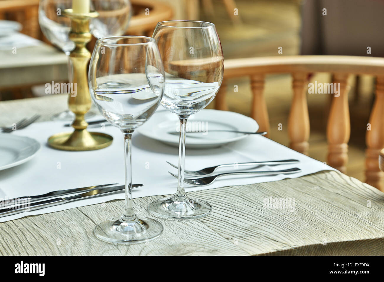 Table setting with wine glasses at the vintage café Stock Photo Alamy