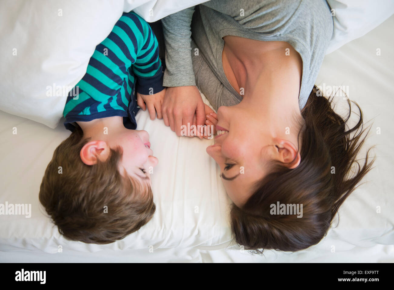 Mother son together in bed hires stock photography and images Alamy