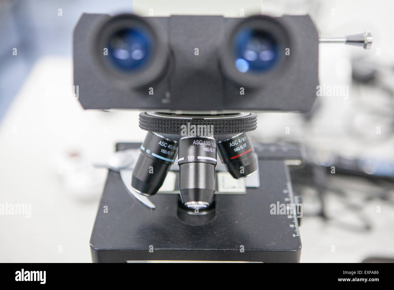 Close up of microscope in laboratory Stock Photo