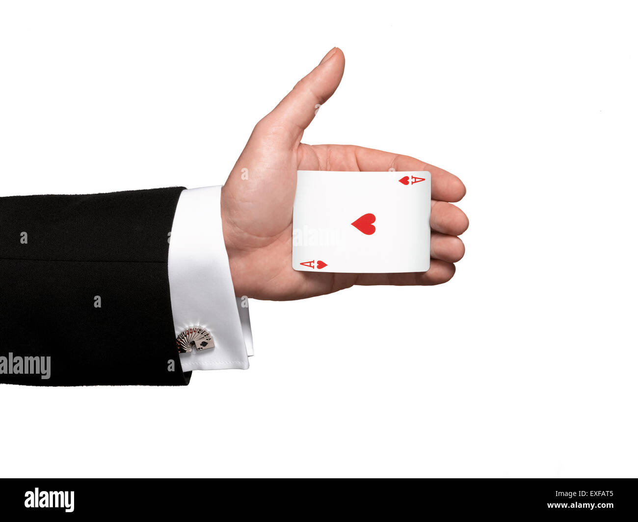 A magicians hand palming the Ace of hearts Stock Photo