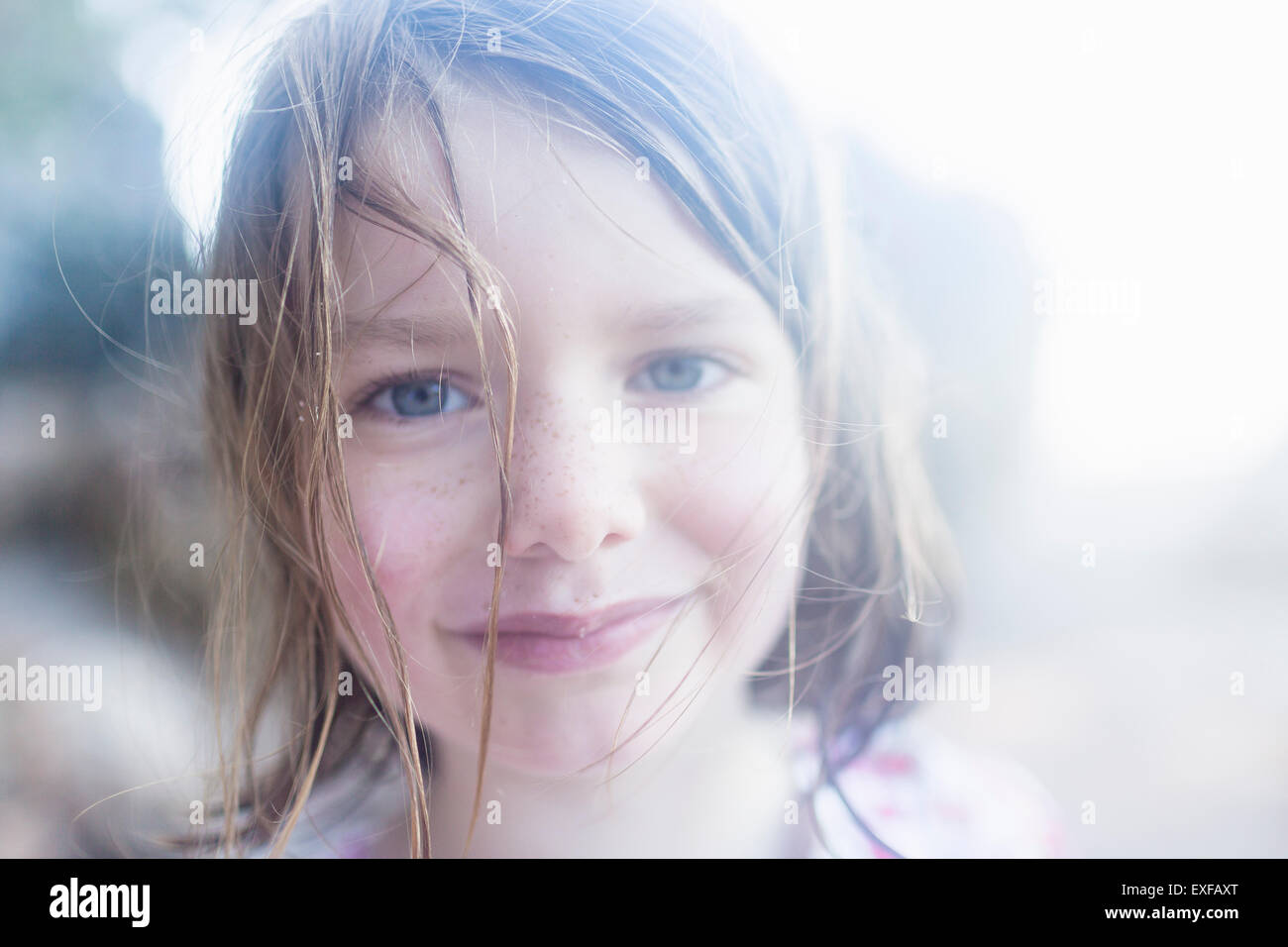 Happy and contented girl Stock Photo