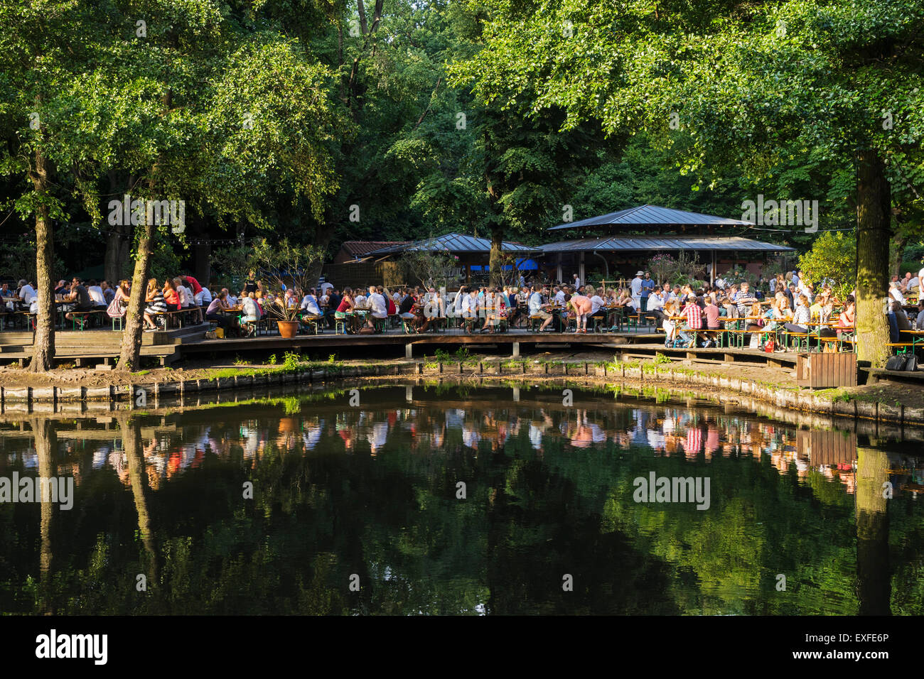 Busy beer garden in summer at Cafe am Neuen See in Tiergarten park in Berlin Germany Stock Photo