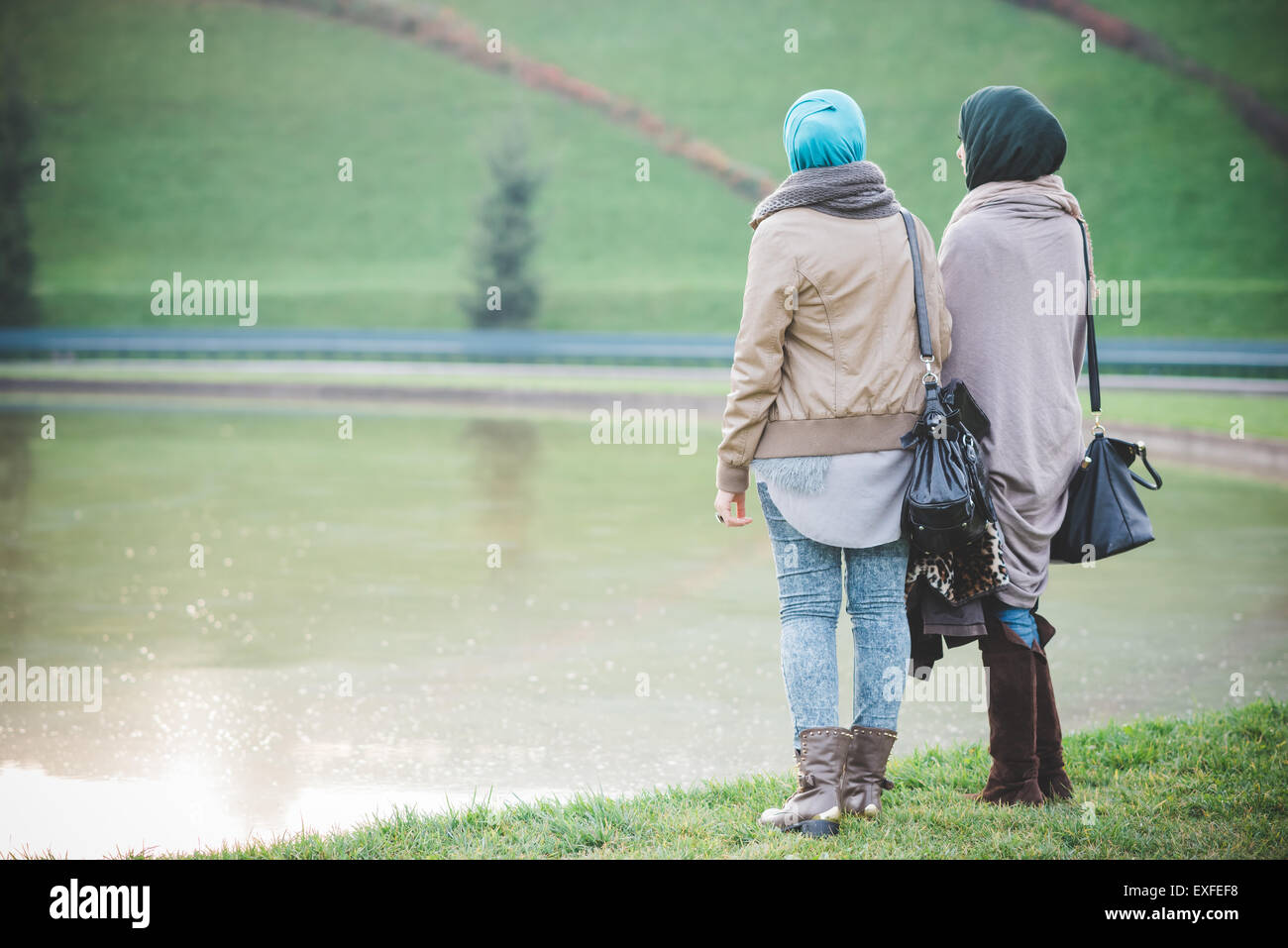 Two women rear view hi-res stock photography and images - Alamy