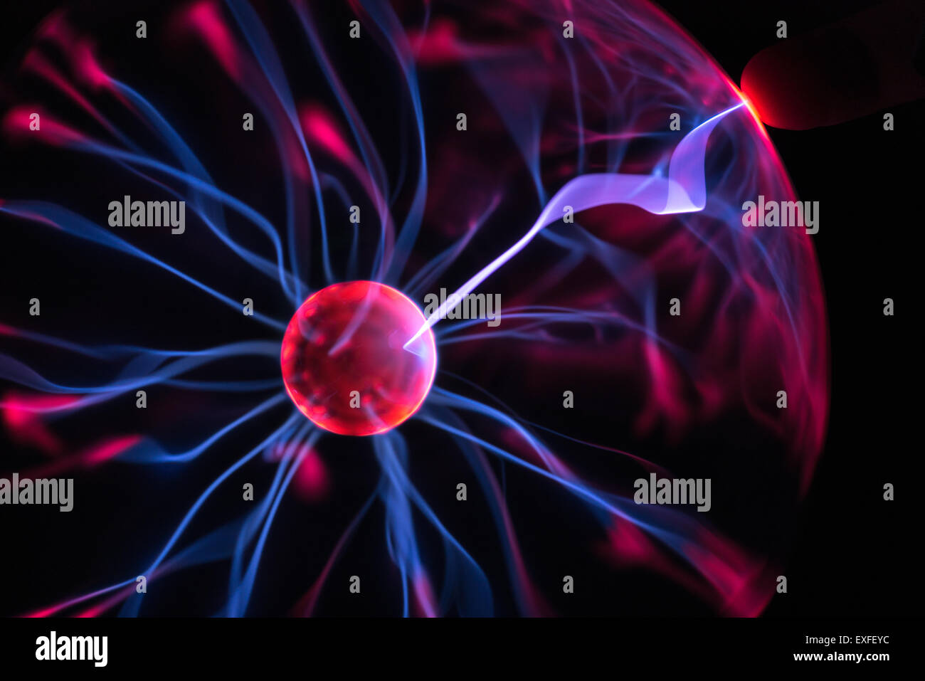 High voltage plasma discharge over time jumping between potential differences paths of least resistance Stock Photo