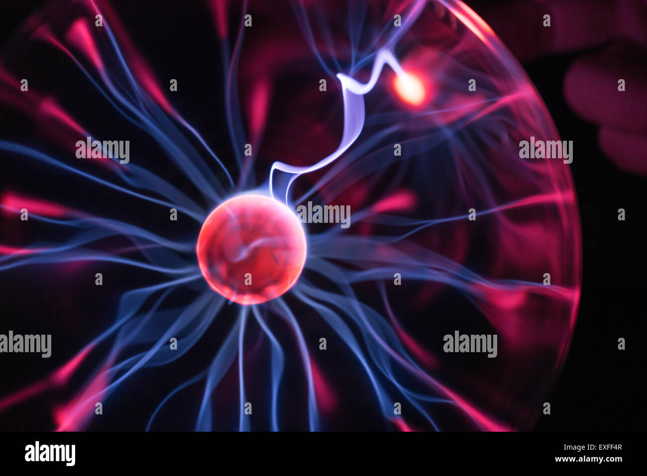 High voltage plasma discharge over time jumping between potential differences paths of least resistance Stock Photo