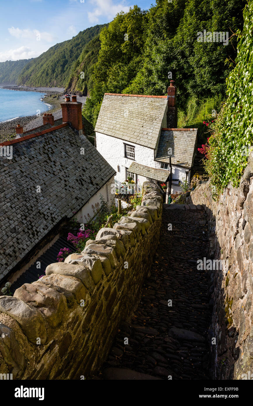 Steep alley leading down to the harbour of Clovelly a fishing village on the north Devon coast Stock Photo