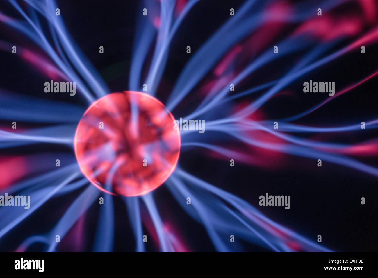 High voltage plasma discharge over time jumping between potential differences paths of least resistance Stock Photo