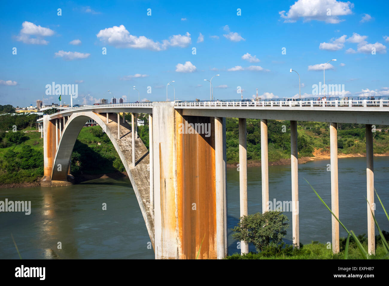 View of the Friendship Bridge (Ponte da Amizade), connecting Foz do Iguacu, Brazil, to Ciudad del Este in Paraguay. Stock Photo