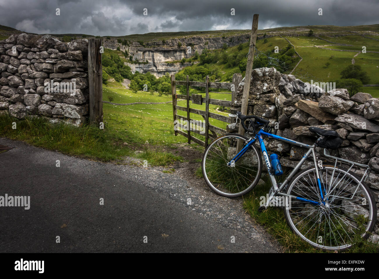 Cycling in the countryside Malham cove by bike, Yorkshire Dales road