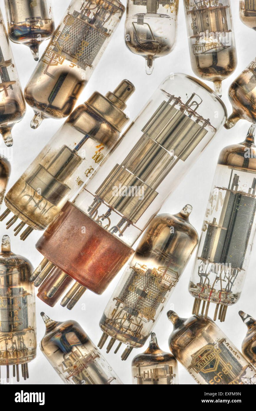 Collection of old used glass vacuum tubes used in radio and early tv crt amplifiers anode and cathode with filament collectors Stock Photo