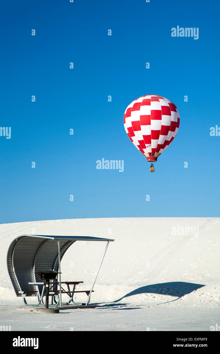 Hot air balloon over dunes and picnic shelter, White Sands Hot Air