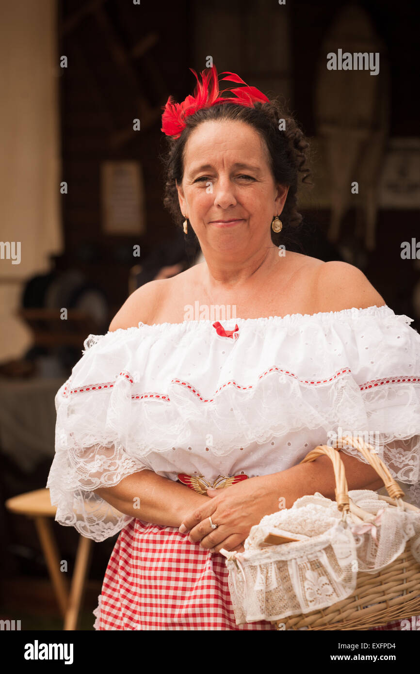 Middle aged woman dressed in nineteenth century clothes as worn by ...