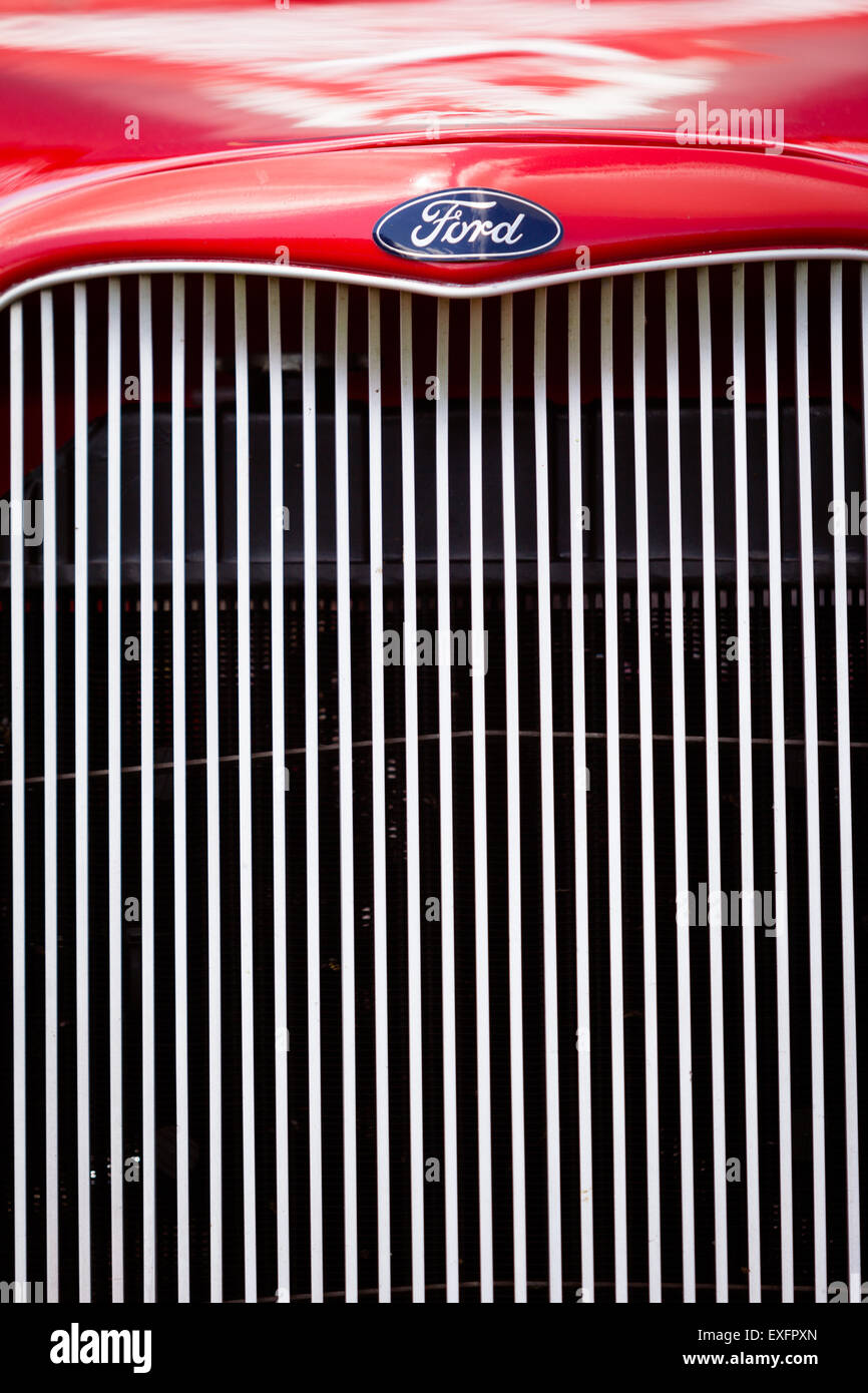 Classic American car fender grille front of vehicle close up Stock