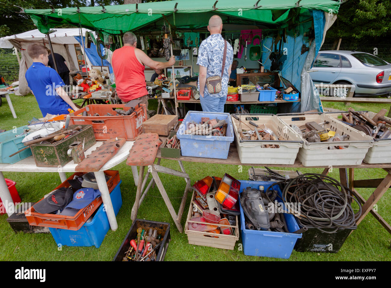 Outdoor market stall at a classic car show, selling car parts and tools, UK Stock Photo