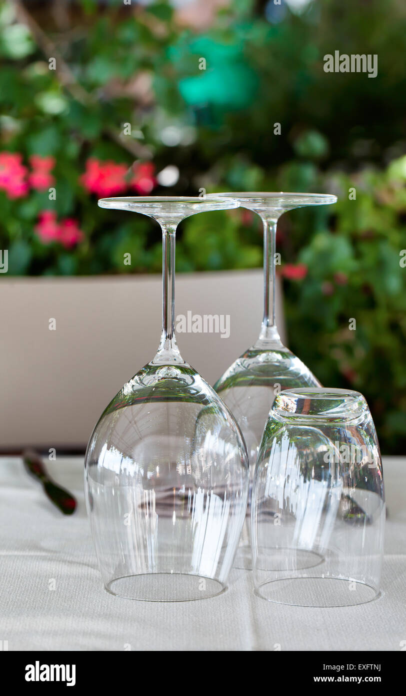 Empty Glasses On Table Stock Photo - Alamy