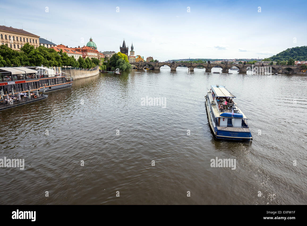 Floating boat restaurant in old town on river Vltava central Prague, Czech Republic,  Europe Stock Photo