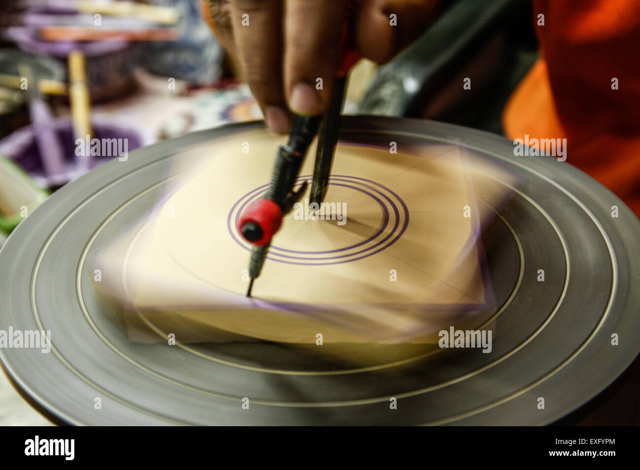 Moroccan Artisan in Fez Creating Designs on Rotating Tile Stock Photo ...