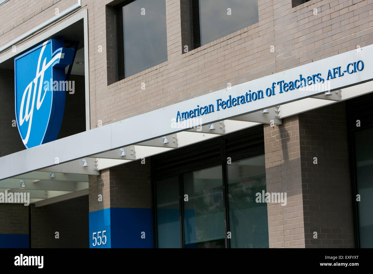 A logo sign outside of the headquarters of the American Federation of Teachers (AFT) in Washington, D.C. on July 12, 2015. Stock Photo