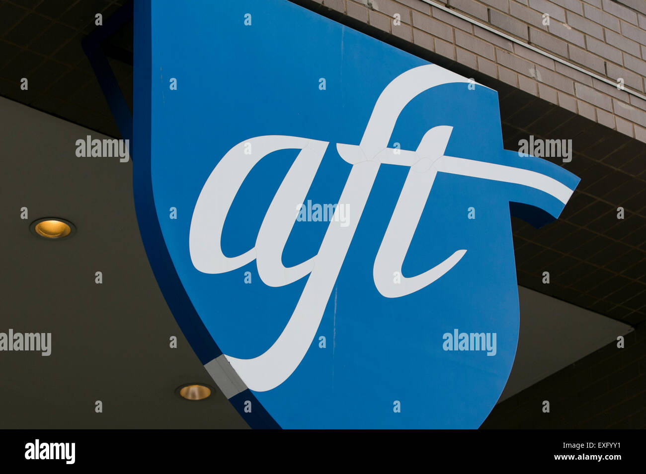A logo sign outside of the headquarters of the American Federation of Teachers (AFT) in Washington, D.C. on July 12, 2015. Stock Photo