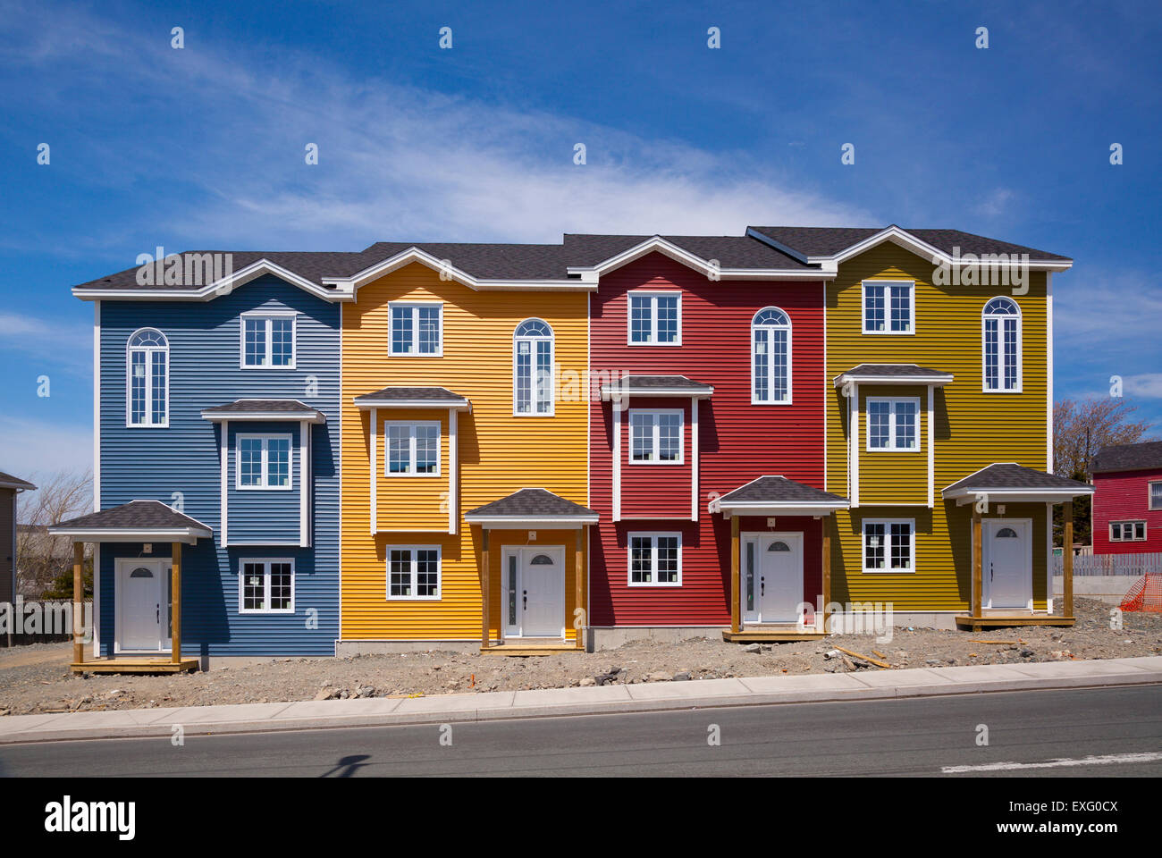 Four brand new colourful row houses on a sunny day in St. John's